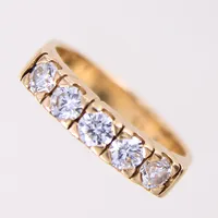 Ring med diamanter 5xca 0,15ct, 0,75ctv, ca TCr(I)/VS-SI, stl 16¼, bredd 4mm, Schalin, 18K Vikt: 5,2 g