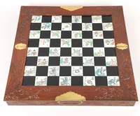 Schackspel med tillhörande pjäser i konstmassa, hopfällbart, Kina 1900-tal, 46x46cm  Skickas med postpaket.