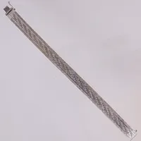 Armband, längd 18,5cm, bredd 10,2mm, importstämplat, 835/1000 silver. Vikt: 25,8 g