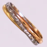 Ring, tricolor, åttkantslipade diamanter ca 0,06ctv, stl 17, bredd 3mm, 18K. Vikt: 2,3 g