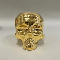 Ljuslykta Still Life Skull Gold, Kosta Boda, design Ludvig Löfgren, höjd 8,5cm, tillhörande box Skickas med paket.