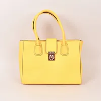 Väska Folli Follie, gult konstläder med roséfärgade detaljer, ca 33x26x12cm, dustbag, slitage, fläckar.  Skickas med postpaket.