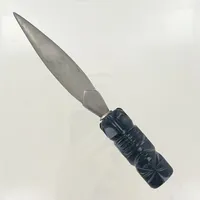 Brevkniv med svart sten, längd 18,5 cm, defekt flisa på baksidan, HSG 