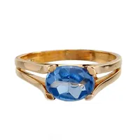 Ring, 18K guld, ljusblå Spinell Ø 6x8 mm, tillverkare RCG, Karlsborg, svensk kontrollstämpel, Ø19¾ mm, bredd 2,7 - 6 mm, fint skick, sten utan anmärkning Vikt: 4,8 g