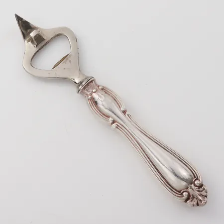 Kapsylöppnare modell Olga, nysilver och rostfritt, längd 16.5 cm. Vikt: 0 g