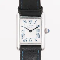 Damur Cartier Tank, silver, quartz, ref-nr:6057002, serie-nr:02238, 27x20, original band, mindre repor, skadad krona, inga tillbehör.  Vikt: 0 g