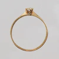 Ring med 1xca0,01ct diamant stl 16 bredd 1-3mm, GFAB 1985 18K Vikt: 1,3 g