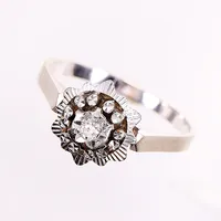 Ring, diamant 0,04ct, stl 18½, bredd 1,5-11mm, vitguld, 18K.  Vikt: 3,3 g
