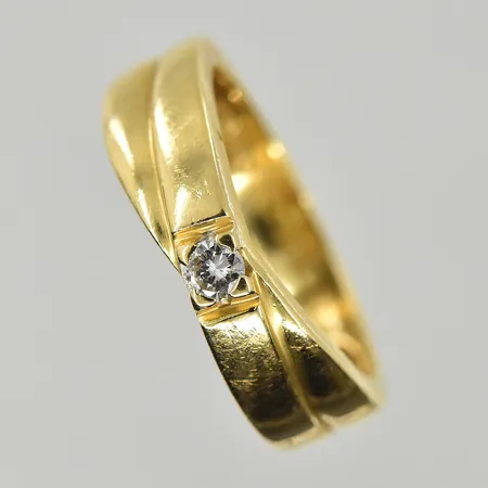 Ring med diamant 0,05ct, stl 16¾, 18K. Vikt: 4,4 g