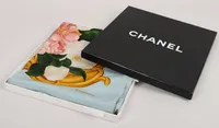 Scarf Chanel, siden, motiv av spegel med blommor, ca 94x94cm , originalkartong med ställvis hårt slitage, fläckar. 
