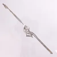 Armband vitguld med diamanter 14 x ca 0,01ct - 0,05ct, 18cm, bredd: 4,5-11mm, behov av omrodiering, 18K  Vikt: 26,4 g