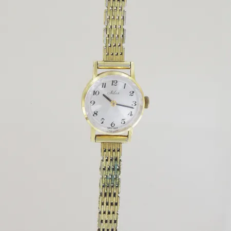 Armbandsur Nilax, diam 21 mm, 18K boett, går ej, defekt stål armband Vikt: 24 g