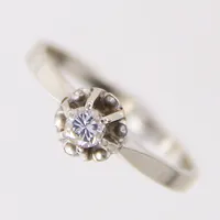 Ring med diamant ca 0,15ct, stl 16½, bredd 2mm, vitguld, 18K  Vikt: 2 g