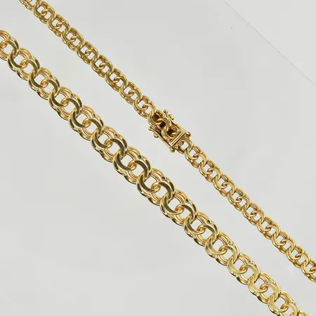 Collier Bismarck, doserad, längd 45 cm, bredd 4-8 mm, 18K. Vikt: 26 g