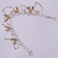 Armband med berlocker, längd: ca 18cm, bredd. ca 7-30mm, delvis förgylld, 925/1000, silver  Vikt: 16,4 g