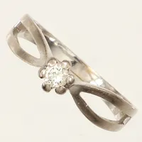 Ring, diamant ca0,14ct, vitguld, stl18¾, bredd 2,1-5mm, 18K Vikt: 3,6 g