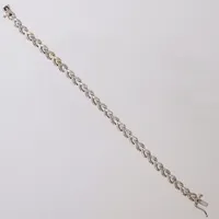 Armband med diamanter ca 105x ca 0,0025 - 0,005ct, längd 17cm, bredd 5mm, vitguld, GHA, 18K  Vikt: 13,5 g