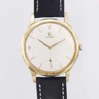 Herrur Omega, manuell, Ø35mm, boett guld 14K, plastglas, repigt, 1960-tal, gravyr, läderband ej original, etui. Vikt: 39,6 g