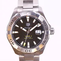 Herrur Tag Heuer Aquaracer Calibre 5, stål, automat, ca 43mm, refnr: WAY210, serienr RHU0489, datumfönster, stållänk, smärre bruksrepor, garantikort 2019-04-22, manual, box samt defekt ytterkartong.