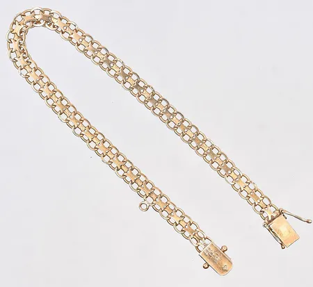 Armband X-länk, längd 19,5 cm, bredd 6 mm, 18K. Vikt: 8,7 g