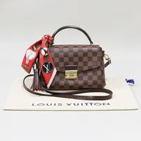 Väska Louis Vuitton Croisette Bag, Damier Ebene Canvas, 24x17x9.5cm, avtagbar axelrem, beslag i gulmetall, kvitto Birger Jarlsgatan Stockholm Juli 2021, något slitage på lås, dustbag, inga övriga tillbehör.