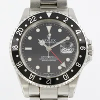 Herrur Rolex GMT Master II, Ø40mm, stål, automat, safirglas, referensnr:16710, serienr: Y539271, kaliber :3185, boettnr: 2180, 2st extra länkbitar, länk 18cm, oysterlänk, plastring runt brezel, 3st foldrar, certifikat Hong Kong -2003, äkthetsintyg från Kristoffers Guldateljé i Göteborg, bruttovikt 124g