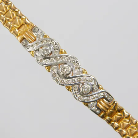 Armband med diamanter 3xca0,12ct + 48xca0,03-0,04ct, 16,5cm, bredd: 9,4mm, 18K Vikt: 35,7 g