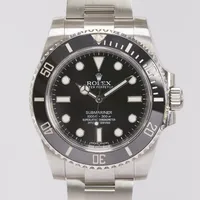 Herrur Rolex Submariner No-date, stål, automatisk, 40mm, ref: 114060, snr: U34G1099, Cal. 3130, verknr: 858JM561, safirglas, 1000ft/300m, oysterlänk, viklås, extra länkbitar, tags, certifikat daterat 17.08.2015 Bergströms ur, box, ytterkartong