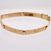 Armband i 18K guld, 19,5cm, halvstelt, bredd 6,4mm, tillverkad av Sporrong, år1989, vikt 19,05g.