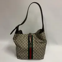 Gucci Axelväska "Jackie 1961", monogramcanvas brunt läder, tyg och beslag i stål, ca 30x30cm, modellnr: 763103 525040 serienr: F041124377, med dustbag och kvitto från Gucci Stockholm januari 2024