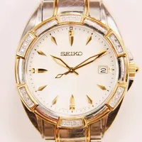 Damur Seiko, 33mm, stål, quartz, pärlemortavla, boettring med 18x diamanter ca 0,01ct, stållänk, batteribyte krävs.