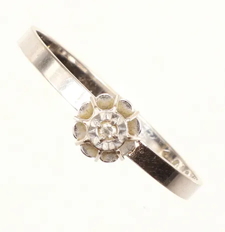 Ring med diamant 1 x ca 0,01ct, stl 17½, bredd 2-5mm, vitguld, 18K Vikt: 1,1 g