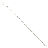 Armband med diamanter 12 x ca 0,02ct, längd ca 18,5cm, bredd 2-4mm, Guldfynd, vitguld, 18K Vikt: 11,4 g