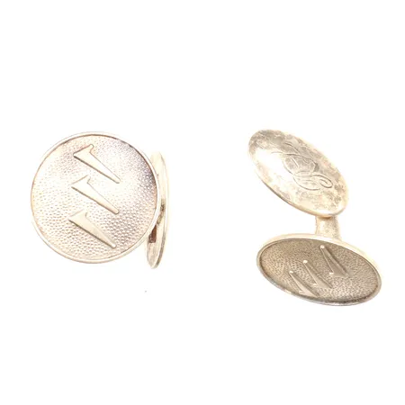 Ett par manschettknappar, dekor i relief, monogramgravyr, Kultakeskus Oy Finland, 813/1000 silver Vikt: 12,2 g