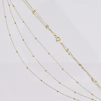 Collier, treradigt, 41cm, kulor Ø 1,7mm, 18K Vikt: 3,2 g