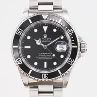 Herrur Rolex Oyster Perpetual Submariner Date, stål, automatisk, ref-nr: 16610, serie-nr: N183810, ca 1991, cal: 3135, verk-nummer: 5980675, boett nr:16610, Ø40mm, kort i länk 10 länkbitar monterade, box.