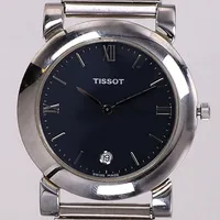 Armbandsur Tissot F385, Swiss Pack, stål, quartz, 35mm,  blå urtavla, safirglas, datum, 1990-tal, armband i stål ej original, inga tillbehör.  Vikt: 0 g