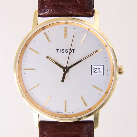  Herrur Tissot 14K, quartz, Ø33mm, datum, står still, läderband samt spänne ej original, 14K bruttovikt 27,1g Vikt: 27,1 g