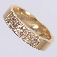 Ring med diamanter  totalt 0,27ct enligt gravyr, stl 18½, bredd 5mm, gravyr, 18K 7,7g Vikt: 7,7 g