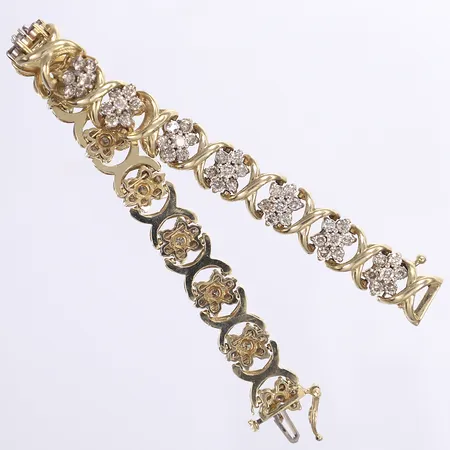 Armband med diamanter totalt ca 6,3ct, ca cape-top cape, piqué, 18,5cm, bredd 10mm, 18K Vikt: 28,5 g