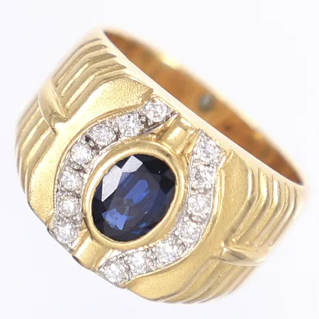 Ring med diamanter och safir, dia ca tot 0,25ct, stl 20, bredd 8-15mm, 18K Vikt: 16 g