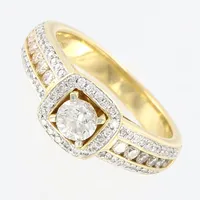 Ring med diamanter, ca 1x0,35ct, 4x0,03ct, 4x0,02ct, 4x0,01ct, 64 mindre diamanter, H-I/Si, stl 16½, bredd: 3-8mm, GHA, 18K  Vikt: 6,5 g