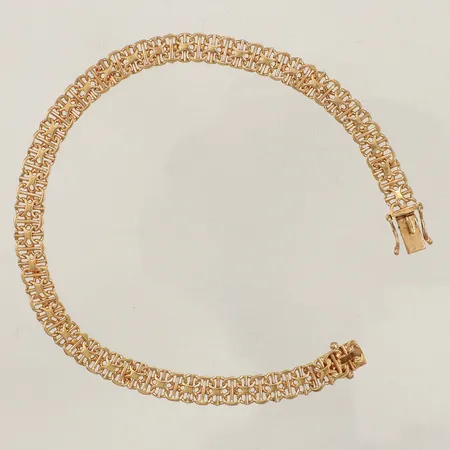 Armband X-länk med stav, längd ca 20cm, ca 5,5mm, bruksskick, något skev länk, 18K Vikt: 11 g