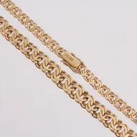 Collier i 14K guld, 42cm, docerad Bismarck, bredd 5,5-8,2mm, vikt 30,92g.