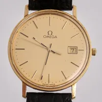 Herrur Omega, Ø33mm, quartz, 14K guld, går ej ställa tid, defekt krona, i behov av batteribyte.