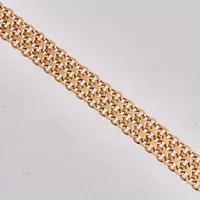 Armband i 18K guld, 18cm, X-länk, bredd 8,7mm, tillverkad av Bertil Blomqvist, år 1957, vikt 12,33g.