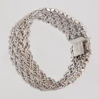 Armband, halvstelt, 19cm, bredd 25mm, Unoaerre, vitguld 18K,  Vikt: 43,6 g