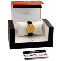 Herrur Tissot T-Gold, 18K guld, Ø33,5 mm, quartz - behov av batteribyte, referensnummer T71.3.411.21, gravyr företag namn 25 år, original skinnband, box, manual, från 2009, obetydligt använd / mycket fint skick