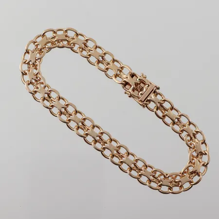 Armband x-länk, stämplat Stockholm 1969, längd 20 cm, bredd 8.4 mm, 18k. Vikt: 22 g