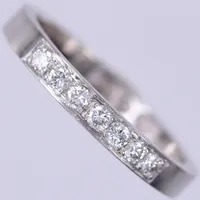 Ring vitguld med diamanter ca 7x0,03ct, stl: 17¼, bredd: ca 3mm, 18K Vikt: 3,5 g